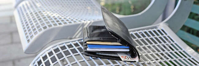 Wallet on a bench on the platform